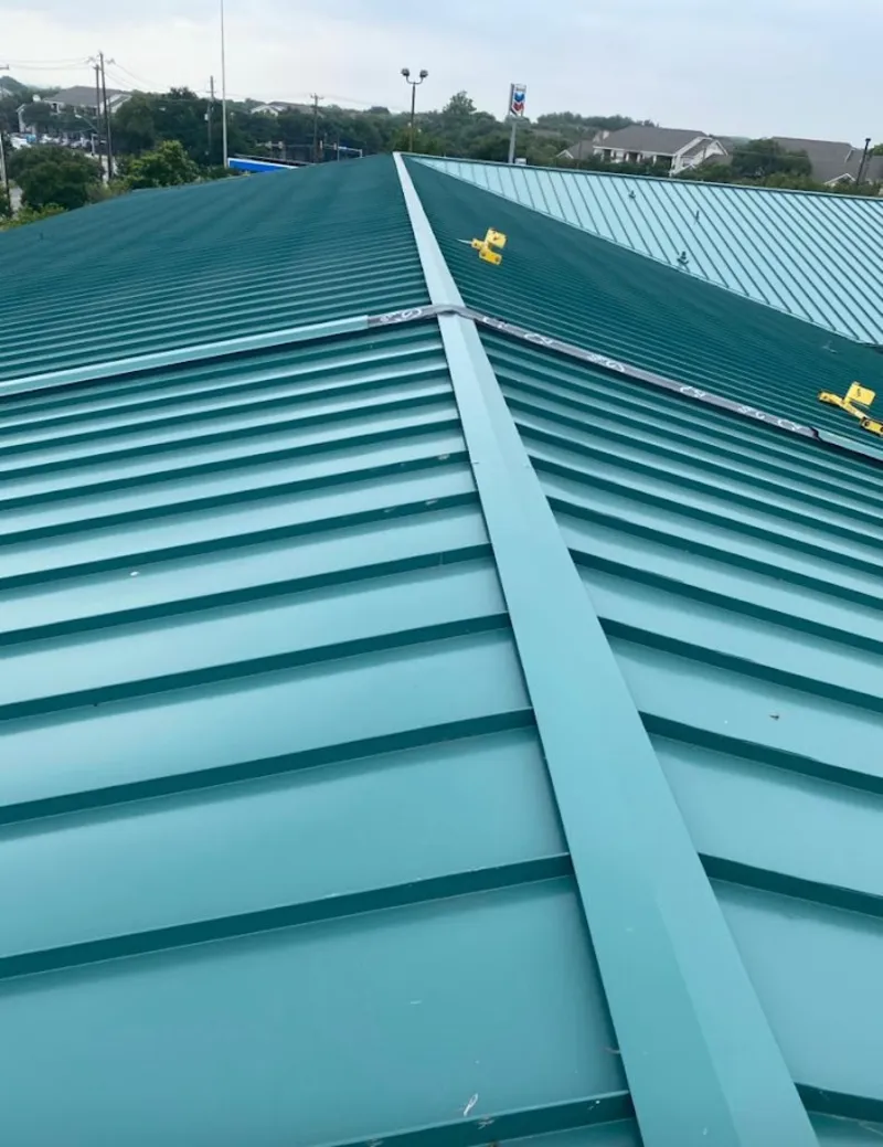 Green commercial metal roof ridge and valley for Metal Roof Repair in Economy